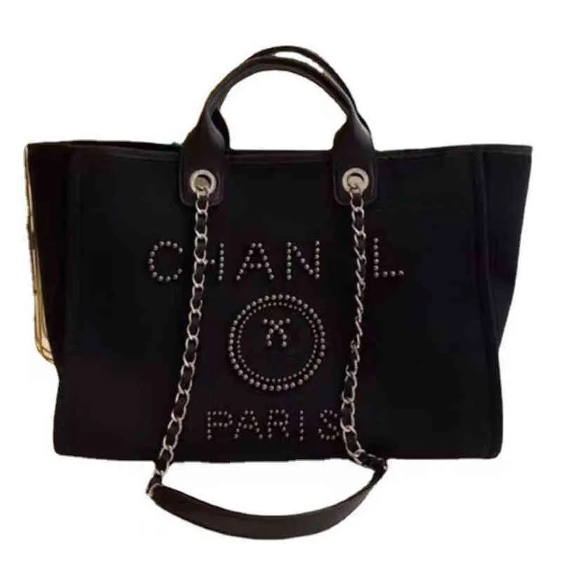 Luxury Classic Fashion Beach Bags Tote Etikett Pearl Evening Bag Portable Large Capacity Female Designer Canvas Handväska Brand Women 283W
