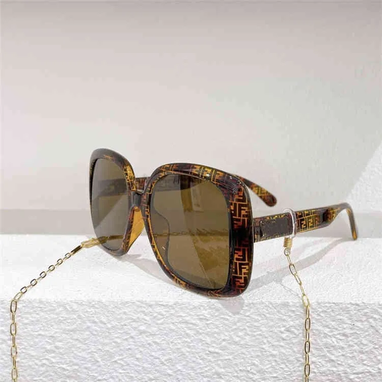 Дизайнерские солнцезащитные очки 10% скидка скидка роскошного дизайнера Новые мужские и женские солнцезащитные очки 20% скидка моды Hot Family Box Tome с цепью