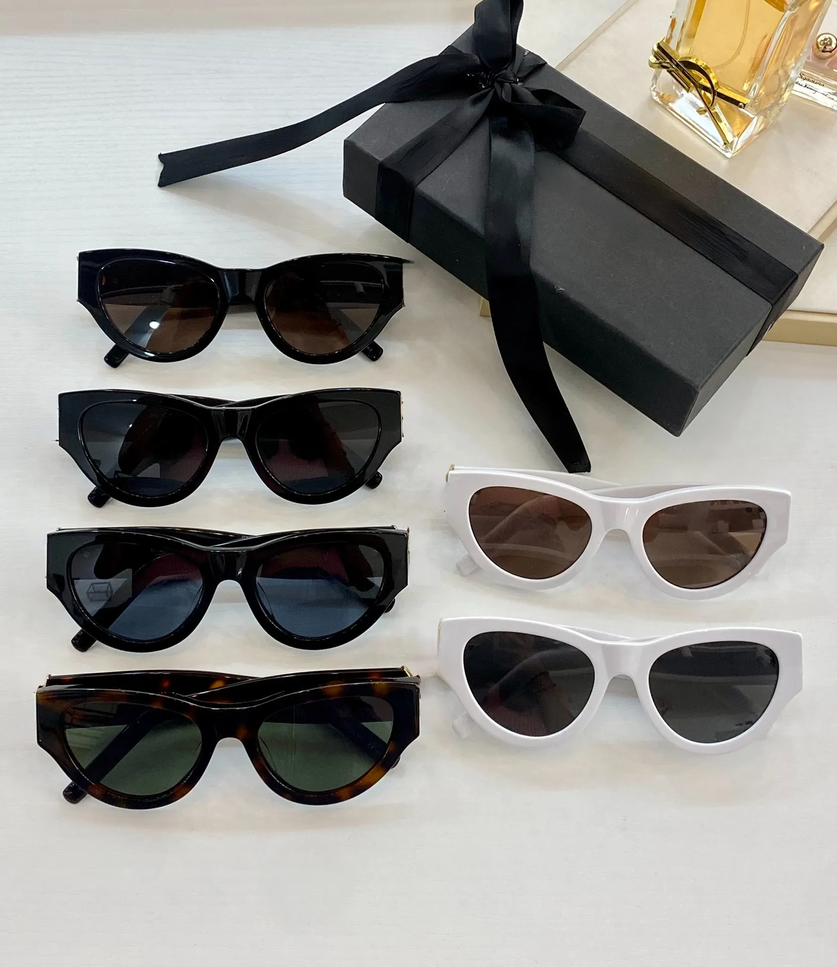 Óculos de sol de designer de luxo Moda de gatos clássicos óculos de sol dos olhos de óculos de sol óculos de praia ao ar livre homens 6 cores opcionais com o caso 5359520