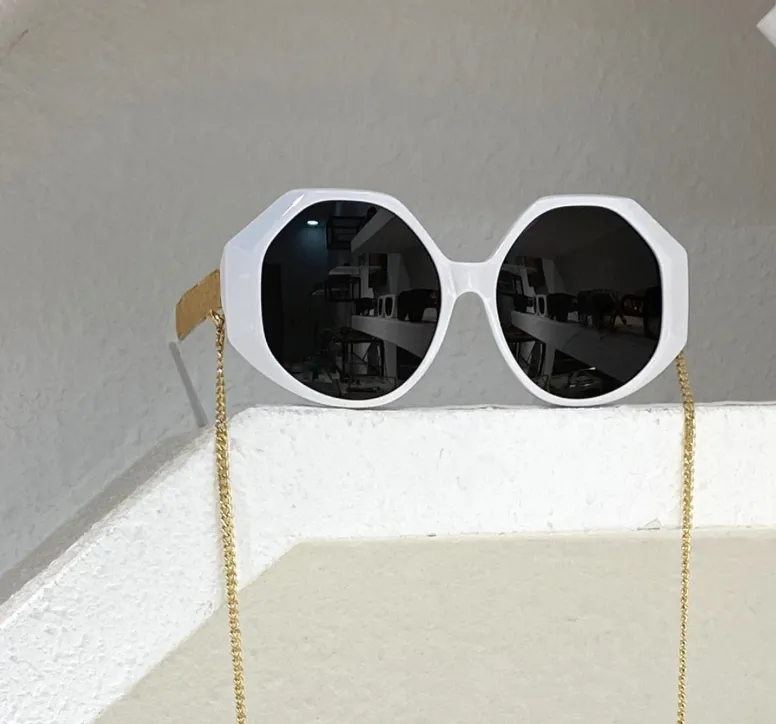 Polygoon vorm zonnebrillen goud zwart donkergrijze lens met ketting sonnenbrille occhiali da sole uv400 bescherming met box208h