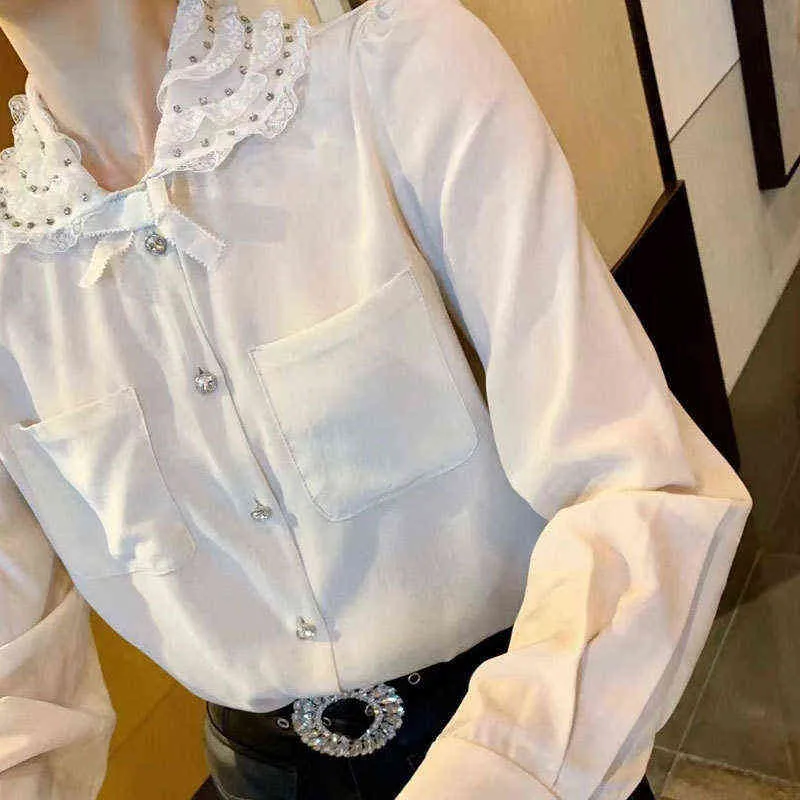 våren ny kvinnoklänning fransk söt spetsdocka krage diamantbockad skjorta vit topp
