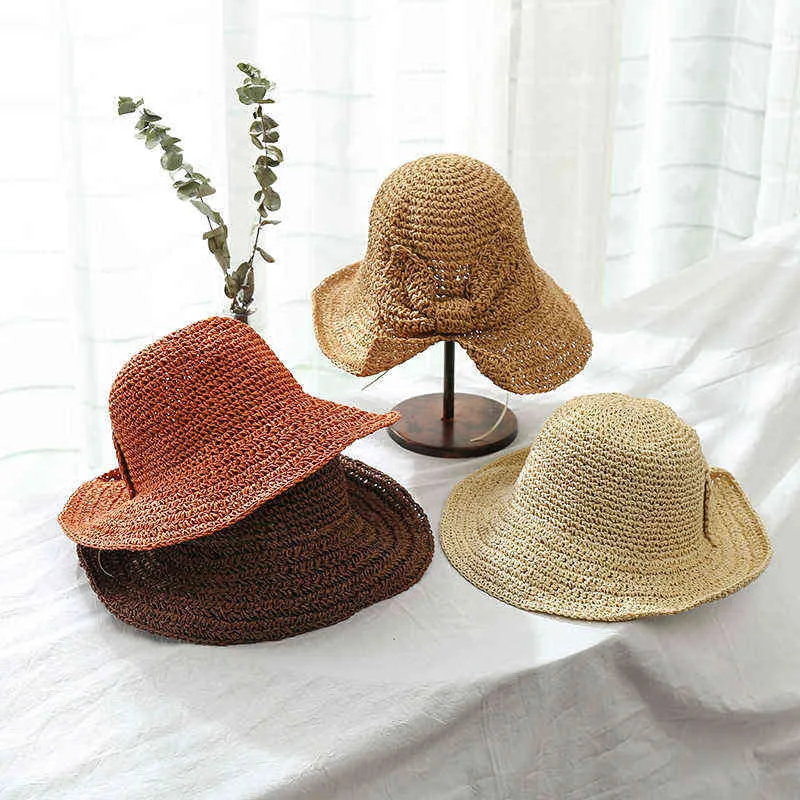 Femmes Chapeau de paille 2022 Été Tricot Weave Cap Beach Style Sweet Sun Chapeaux Style coréen Échantillon élégant avec nœud large chapeau G220301