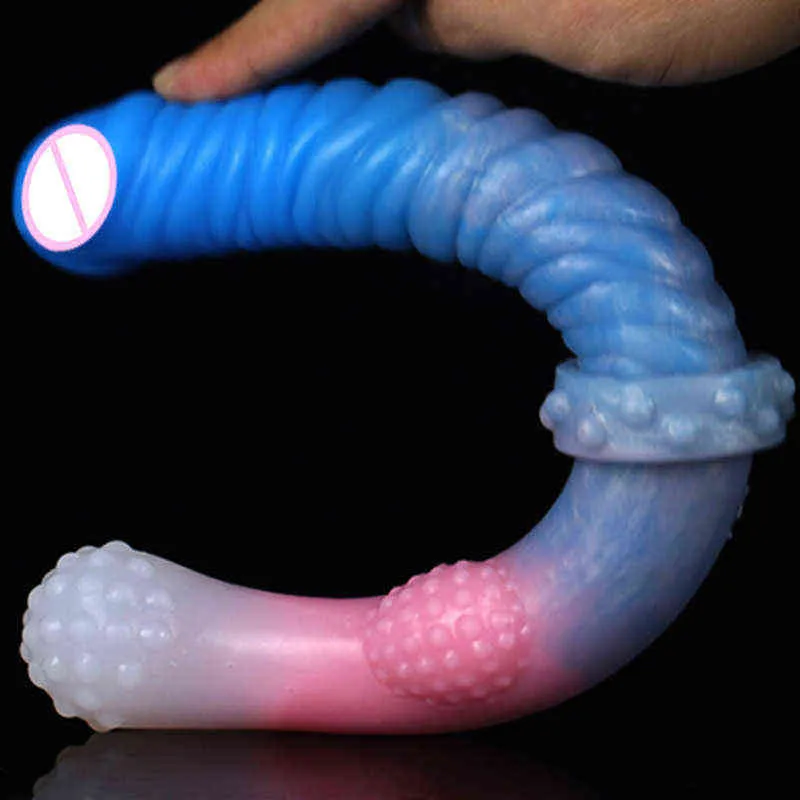 Nxy Dildo New Double Headed Penis Silicone Femminile Soft Massage Stick Masturbazione Appassionato Plug anale a forma speciale Manuale 0316