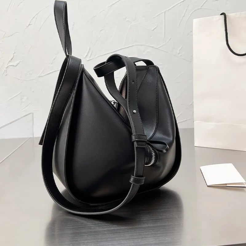 Designer kvinnor väska påsar handväskor kvinnliga ansiktslösa mäns stora kapacitet tecknad spirat bort ryggsäck singel axel väska293m
