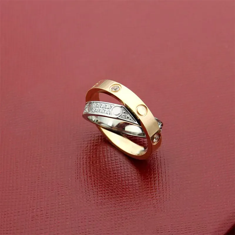 Helt nya Cross Crystal Love Ring Fashion Par Rings för män och kvinnor Högkvalitativ 316L Titanium Designer Rings smycken gåvor250r