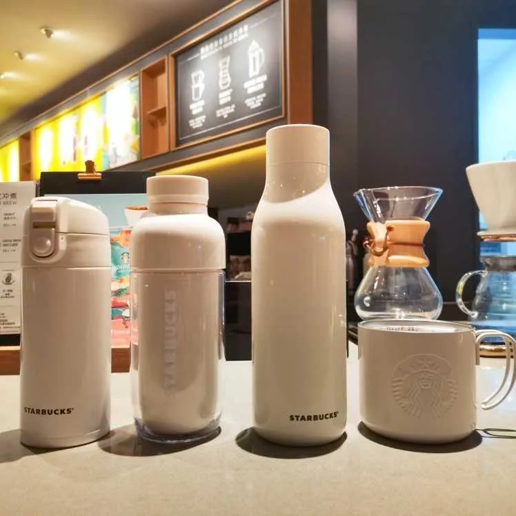 スターバックス夏カップアイボリーホワイトプラスチック冷たい水のボトルステンレス鋼のデスクトップマークを伴う微細な口絶縁水カップ