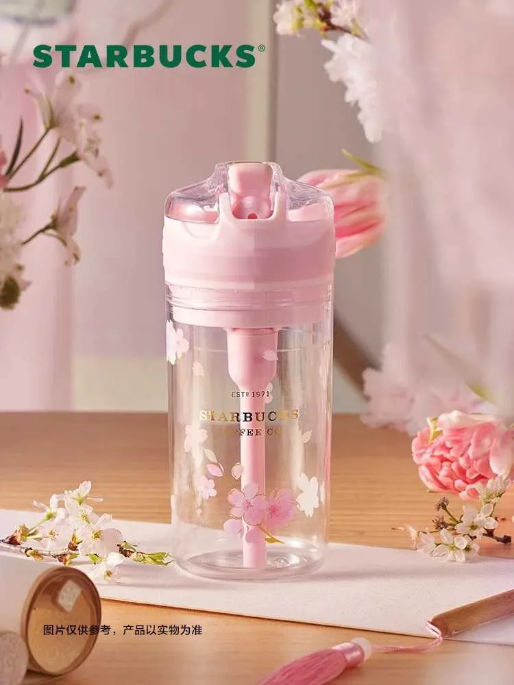 2022 Starbucks Cup Fleurs de cerisier en pleine floraison, poudre de parfum de fleur marque de cerise tasse d'eau isolée en paille de verre