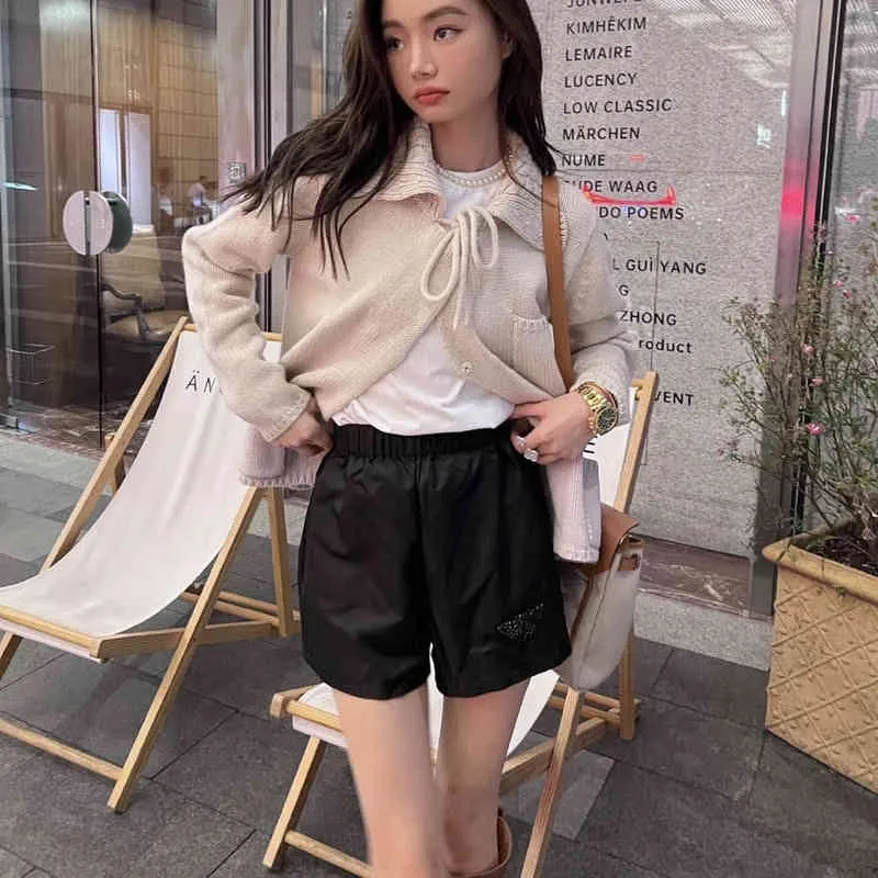 2022 spring and summer new lovers' inverted triangle spiked pearl leisure long shorts for men and women