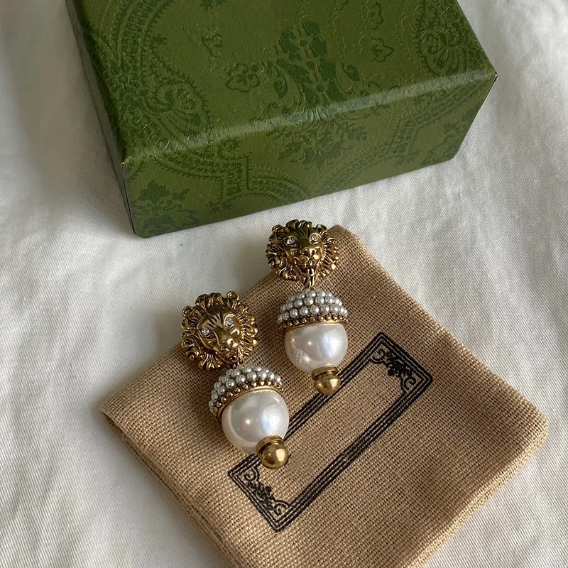 Pearl Gold Earrings Designer för kvinnor Luxurys designers Animal Pendant Studörhängen Luxury Jewelry Earrings Wedding G2205162Z