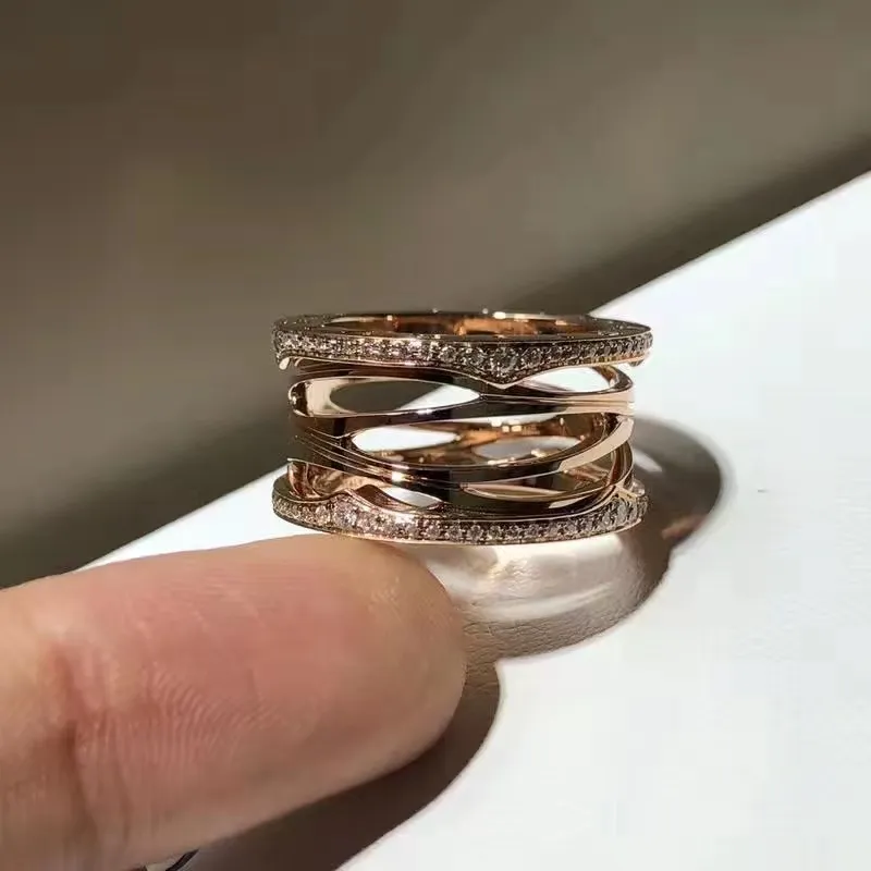 Bague à ressort ajourée de luxe B Bagues de couple à grande largeur Luxurys Bijoux de haute qualité Bagues décontractées Simple deux modèles287W