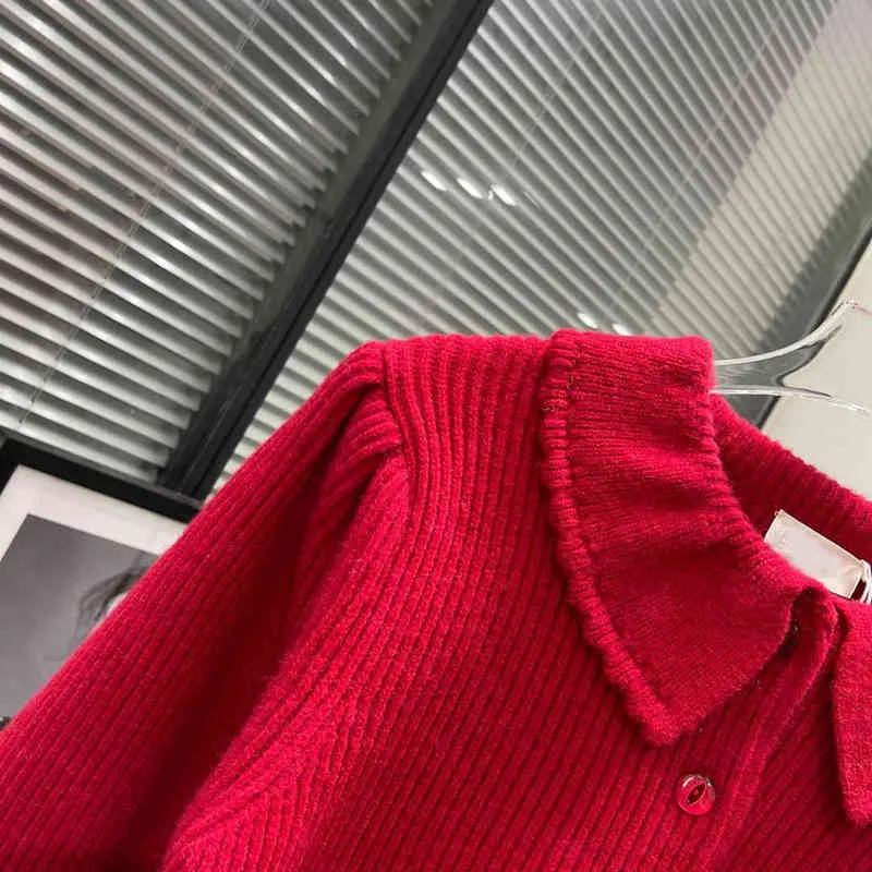 autunno e inverno bambola rossa collo bavero lanterna manica maglia top maglione corto da donna