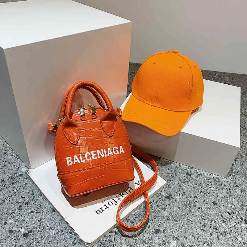 Bolsas com 70% de desconto Mini bolsa pequena feminina 2022 nova versão estampada mensageiro um ombro bolsas de mão