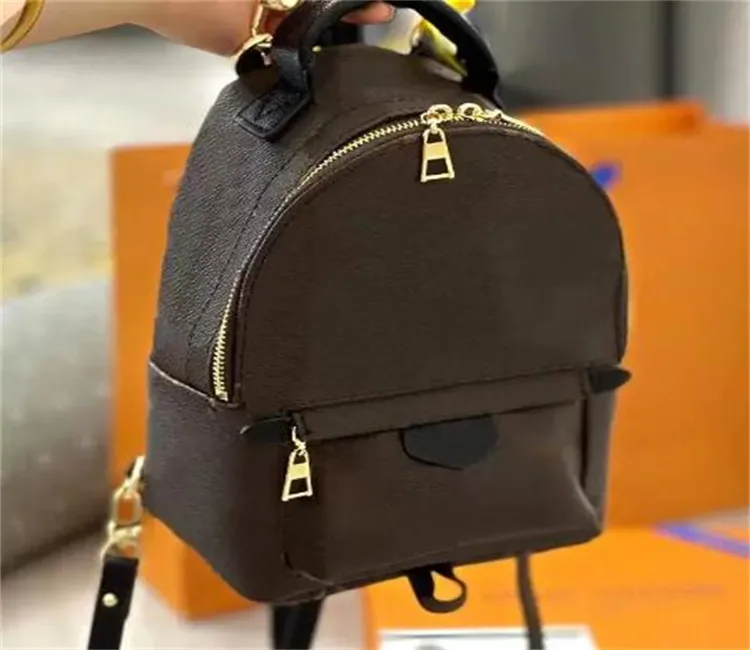 Качественный качество классические пальмовые источники кожаные мини -рюкзаки для мужчин женские школы дизайнерские сумочки леди плеч