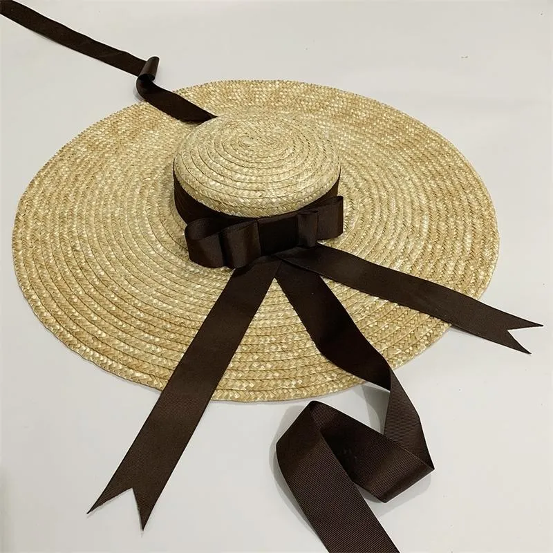 Caluriri Summer largo grande cappello di paglia brimo floppy wheat women flat top nastro prua lady beach sole