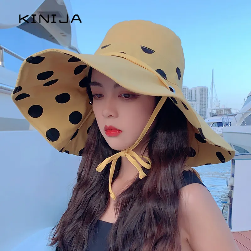 Mujeres de verano Moda de doble cara ancha Sombrero para el sol de ala grande Gorra de pescador de playa al aire libre Sombrero con protección solar a prueba de rayos UV Sombrero de cubo 220519319U