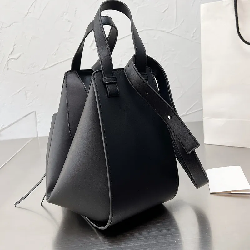 Designerskie torebki torebki torebki kobiety bez twarzy mężczyzn o dużej pojemności kreskówka seride na wyjeździe plecak pojedynczy ramię 293M