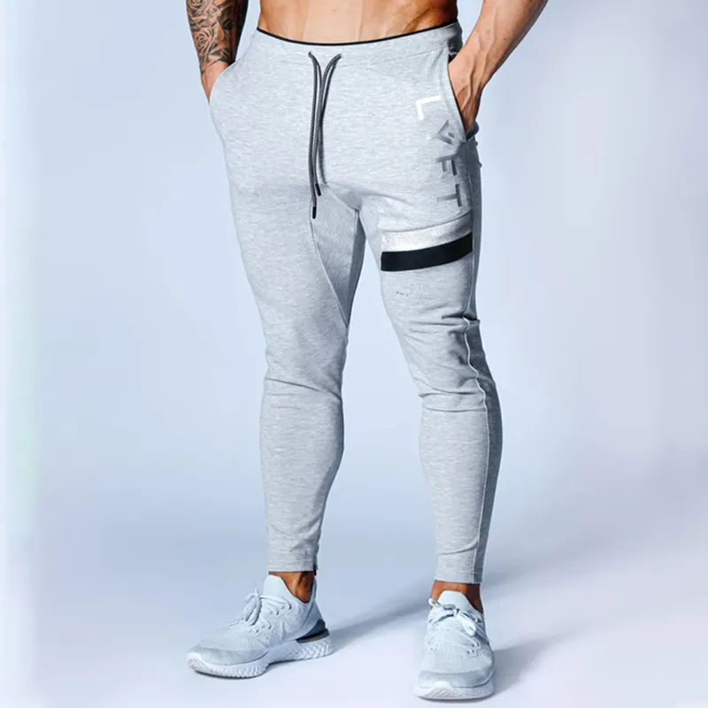 Homens calças de moletom fitness fisicultura de calças de calças casuais homens jogadores calças calças de moletom de algodão slim fit