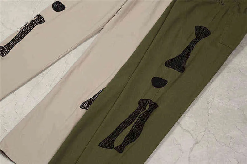 Capital Bone Embroidery Cargo Pants Män Kvinnor Bestkvalitativa joggar High Street Övergripande något kapital Löst byxor T220721