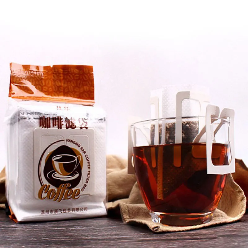 50st/pack engångska kaffefliterpåsar bärbara hängande öronstilfilter miljövänlig papperspåse för espresso 220509