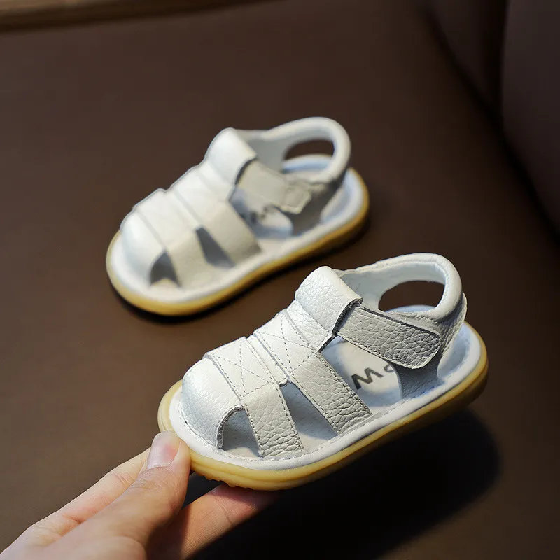 Baby flickor pojkar sommar sandaler spädbarn anti-kollision småbarn skor mjuk botten äkta läder barn barn strand sandaler 220623