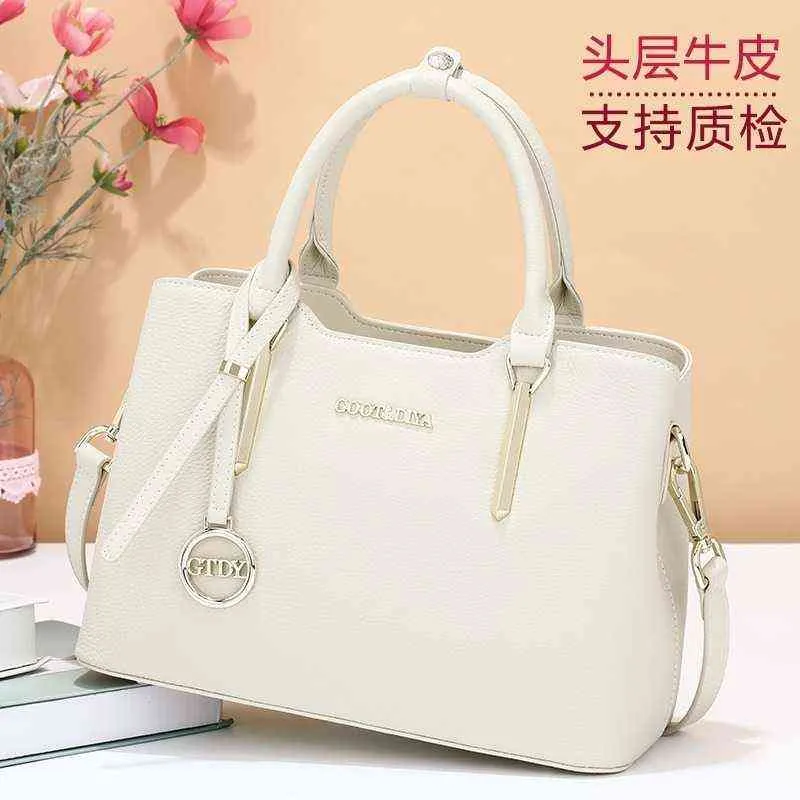 Factory Online Export Designer Bags Tote Leather Women's 2022 Nieuwe messenger High Sense Grote capaciteit Handtas