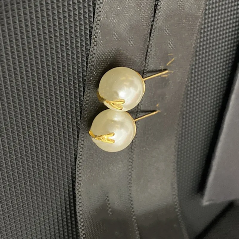 Designer S925 örhängen för kvinnor lyxiga designers pärlbåge örhängen guld örhängen bröllop charm smycken med gratis ask