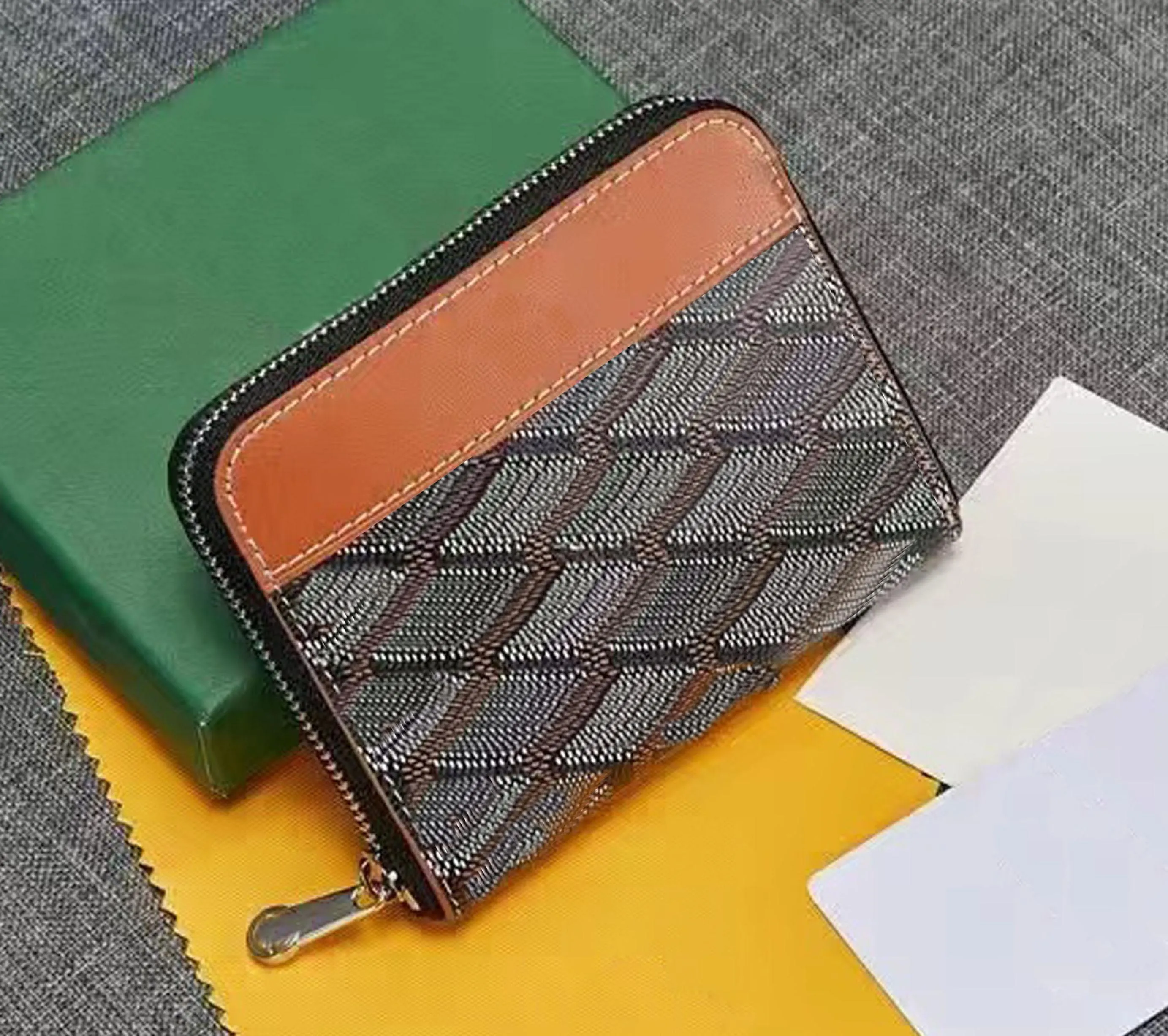 Luxusdesigner -Marke Münze Geldbörsen Männer und Frauen Goyan hochwertige Halbverdächer Cowide höchste Designer Taschen Weihnachten gefaltet in Half Card Wallets Factory Direktverkauf