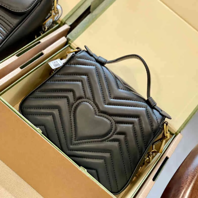Omuz çantası en kaliteli el çantaları deri kadınlar saçaklı haberci klasik çift harfli tokasyon dekorasyon crossbody marka cüzdan 220714