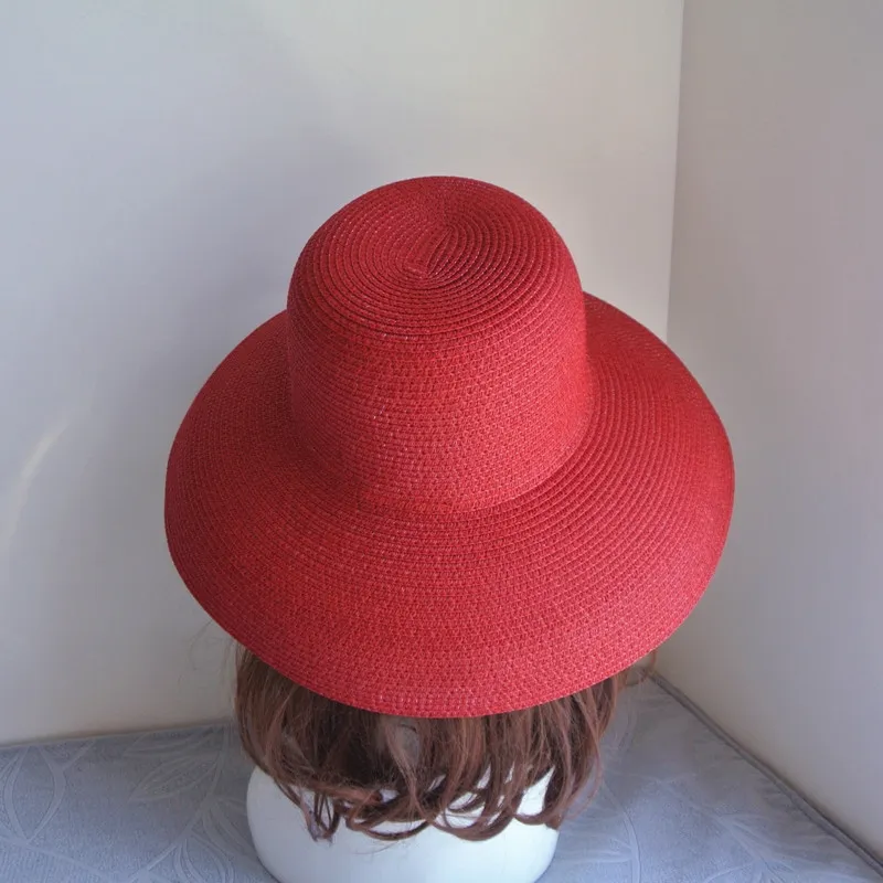 Cappello parasole vintage da donna in puro colore stile Hepburn le vacanze 5658CM Temperamento elegante moda estiva cappello di paglia di alta qualità 2205285Q