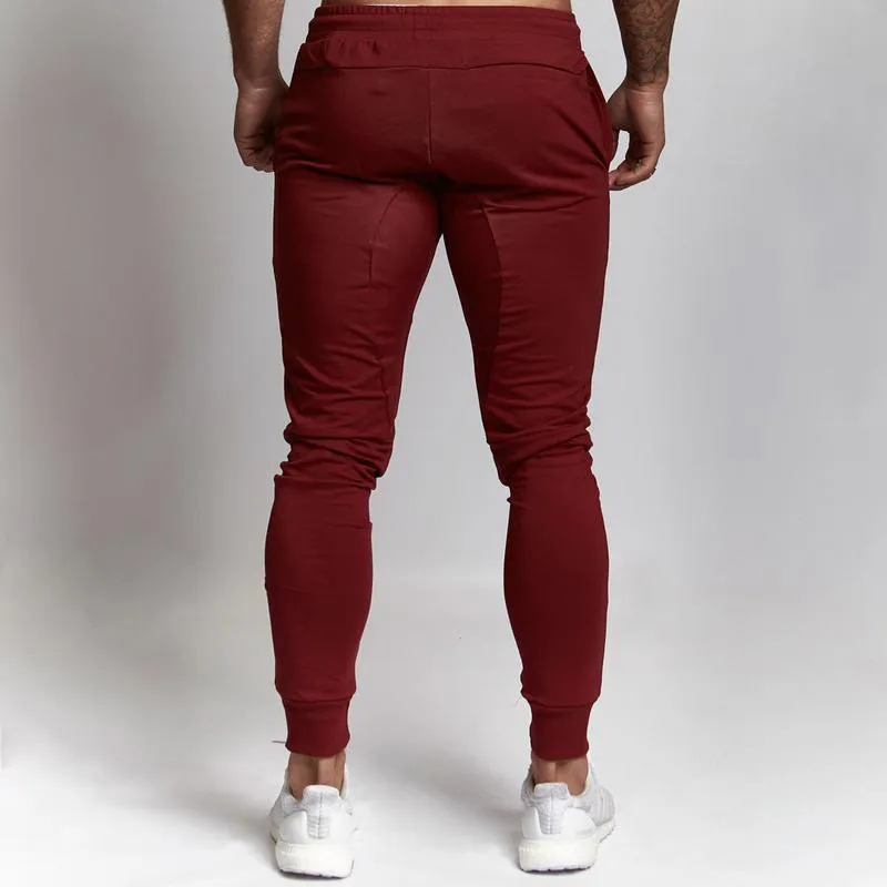 Mode hommes gymnases pantalons Joggers Fitness décontracté pantalons longs hommes entraînement pantalon de survêtement maigre Jogger survêtement coton pantalon 220714