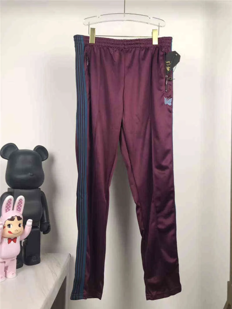 Purple Awge igły spodnie do joggingu motyla haft aksamitna wstążka w paski spodnie igły Najlepsza jakość AWGE Joggers Jogging Spods T220721