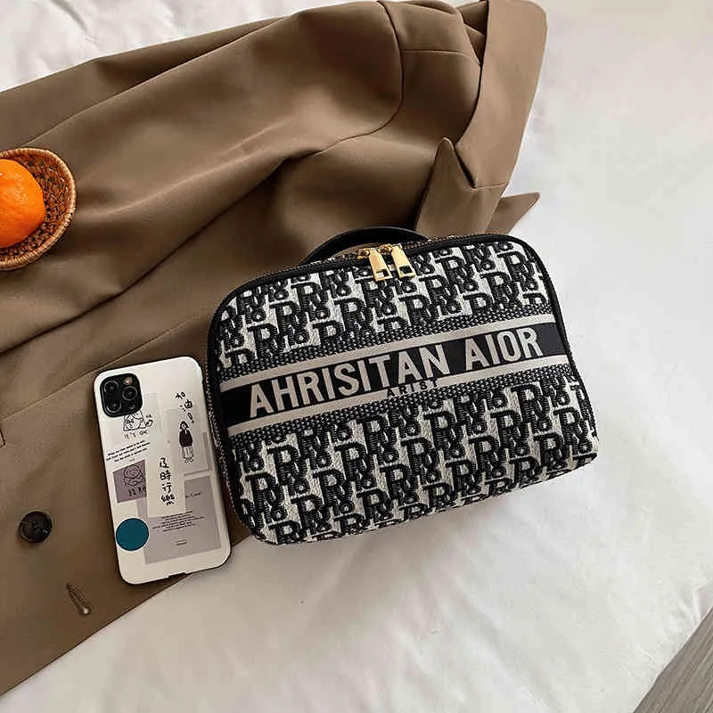 폭발성 모델 62% 할인 2022 새로운 패션 핸드백 가방 화장품 대형 화장품 저장 여행 휴대용 작은 휴대용
