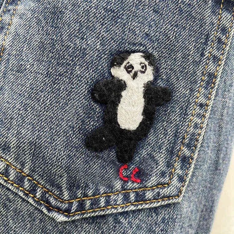 Wiosna i lato super gorące pandę haftowe dżinsowe spodnie wysoko talii
