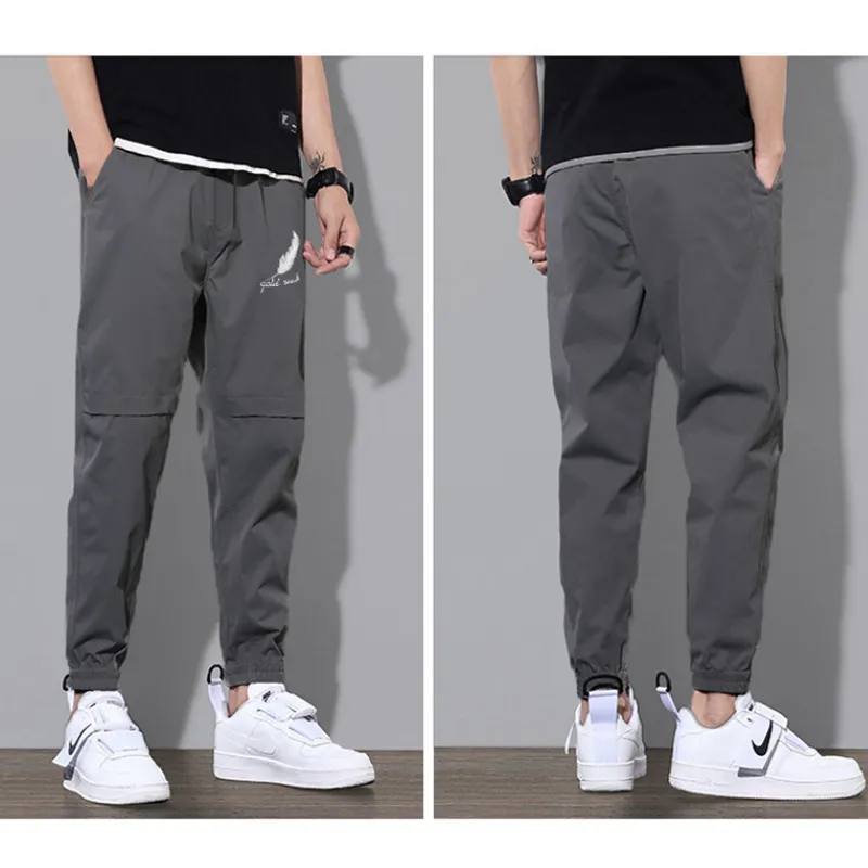 Herr sweatpants joggare män lösa lastbyxor fickor spår taktiska casual techwear manliga byxor sport streetwear 220325