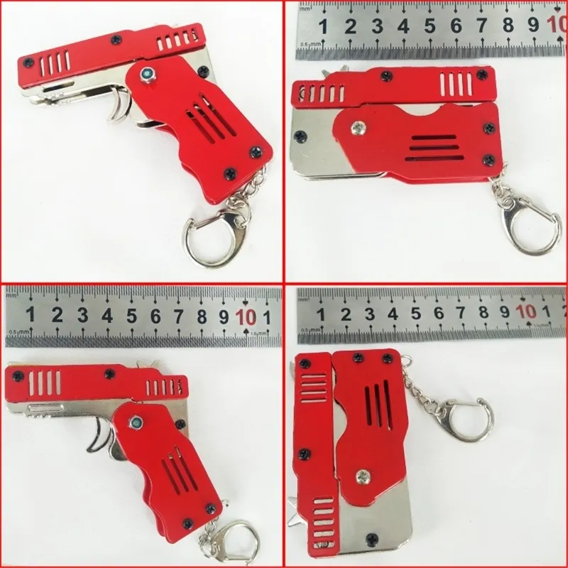 Mini faltbare faltbare Gummiband-Schießpistole Schlüsselanhänger von Outdoor-Spielspielspielzeugen halten 6 Runden Lustiges Partygeschenk für Kinder 220621