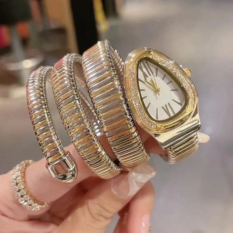 Marca Relojes de pulsera Mujeres Damas Forma de serpiente Estilo de diamante Banda de metal de acero de lujo Reloj de cuarzo Diseñador de moda adecuado duradero 301u