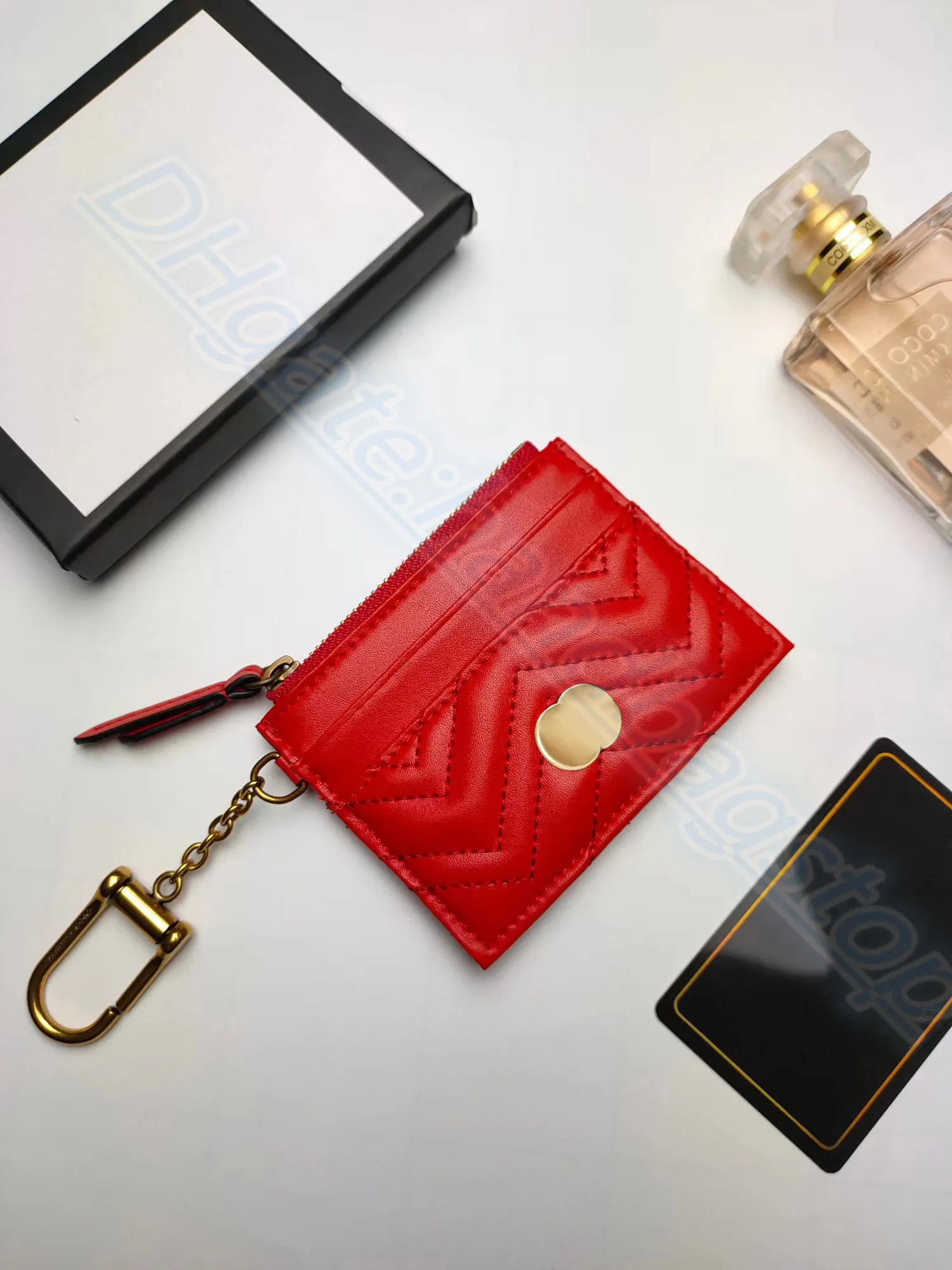 Luxurys designers äkta lädermynt pursar plånböcker korthållare berömda herr plånbok passhållare nyckelpåseldelar mini han226e