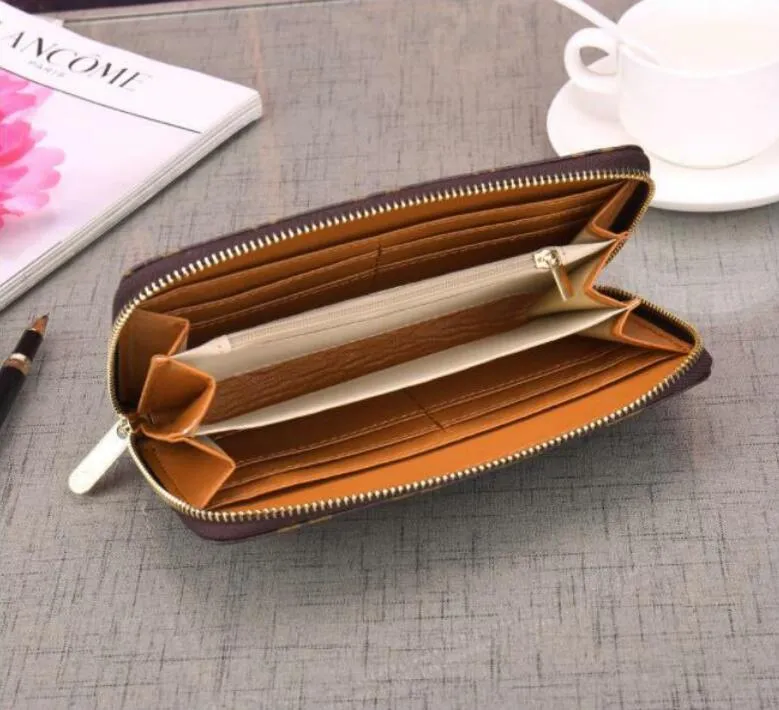 Fashion Mens Women Designer Claking Portefeuille Pu en cuir portefeuille Single Zipper portefeuille Lady Madies Long Classical Purse Card 60017308G