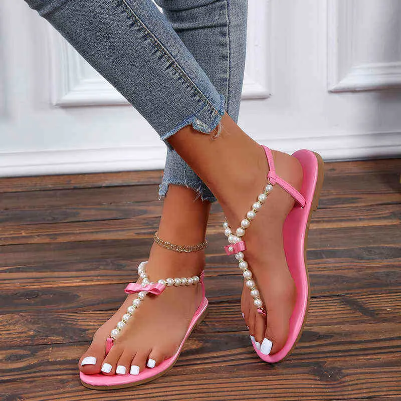 Sandálias nxy verão novo apartamento feminino de pé aberto chinelos rasos sapatos designer string slip-on chinels slides casuais de festa