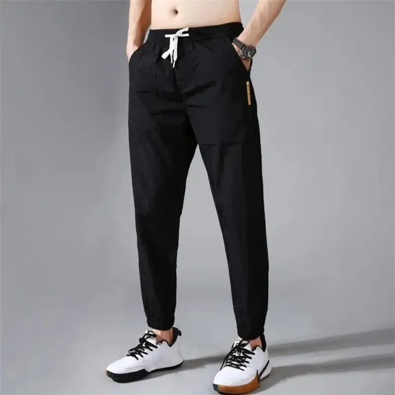 Summer Men Pants Sports Outdoor Casualne spodnie Solidny kolor elastyczny talia lekka wygodna długie spodnie Plus Size 220714