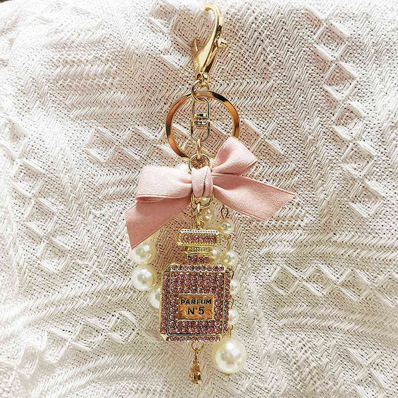 Butelka Pearl Bottle Blak na kobietę luksusowa biżuteria bokować bajnik bownot camellia pereł wisiorka naczyń torby dekoracja AA220318