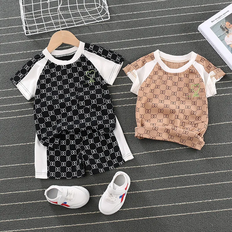 Letnie dzieci bawełna Baby Boy Girl ubrania t-shirty spodenki na szelkach 2 sztuk/zestawów niemowlę dzieci moda maluch dresy