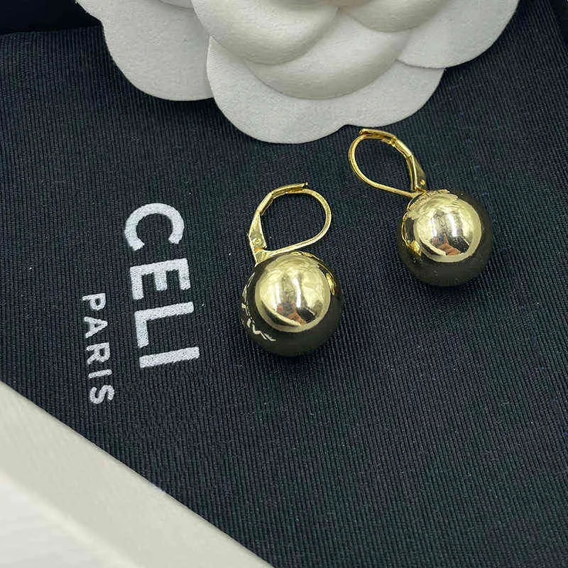 Celi solide Designer boule d'or petites boucles d'oreilles Ins Match maison visage lisse Simple à la mode personnalisé collier plaqué or