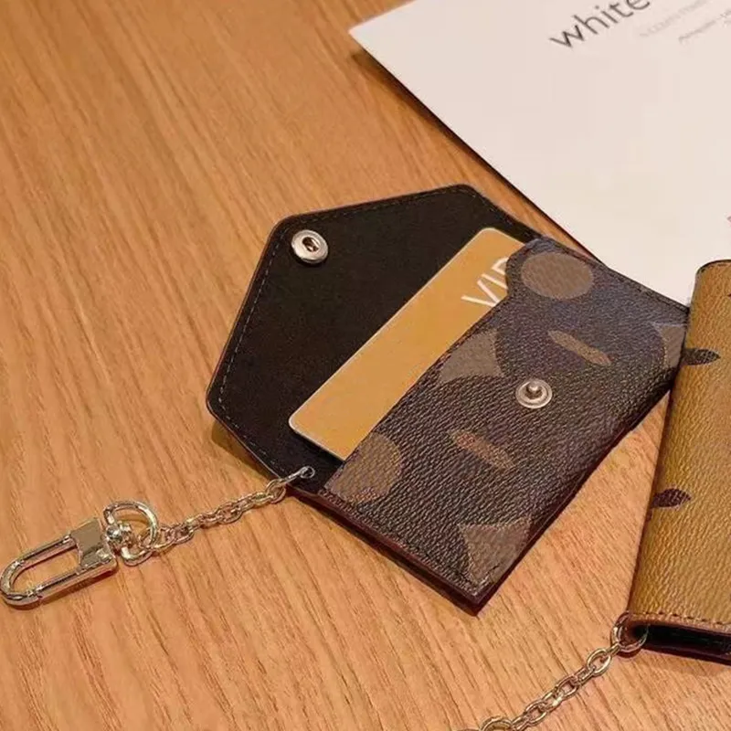 Lyxdesigner dragkedja myntväska korthållare brun av hög kvalitet läder plånböcker kvinnliga plånböcker Mens nyckelchain kredit plånbok väska tra267o