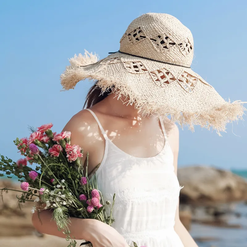 女性夏のナチュラルラフィア麦わら帽子レディースファッションリボンフロッピーシェーディングパナマワイドブリム帽子休暇旅行ビーチハット220607