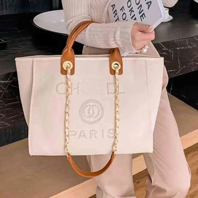 Luxury Classic Fashion Beach Bags Tote Etikett Pearl Evening Bag Portable Large Capacity Female Designer Canvas Handväska Brand Women 283W