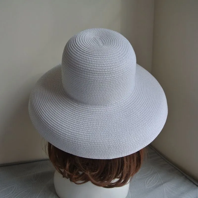 Cappello parasole vintage da donna in puro colore stile Hepburn le vacanze 5658CM Temperamento elegante moda estiva cappello di paglia di alta qualità 2205285Q
