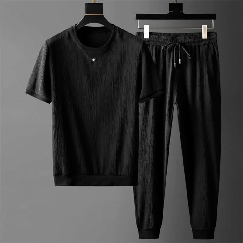 Men's Tracksuits Sets masculino Mangas curtas Tops elásticos da cintura elástica masculino masculino de duas peças conjunto de streetwear coreano masculino grande tamanho 220826