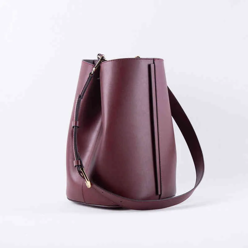 Coréen Minorité Designer Seau Plaine Grain En Cuir De Vache Unique Épaule Messenger Sac Grand Seau Des Femmes 220621