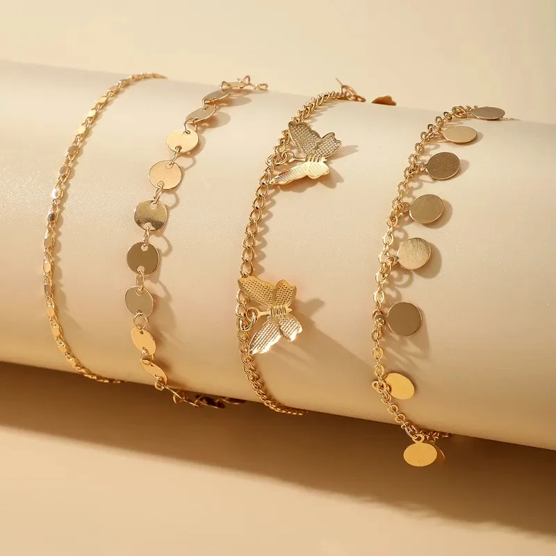 Tocona 4 pezzi set cavigliere alla moda con nappe a farfalla donne con ciondoli color oro lega di metallo catena del piede gioielli bohémien 149854512885
